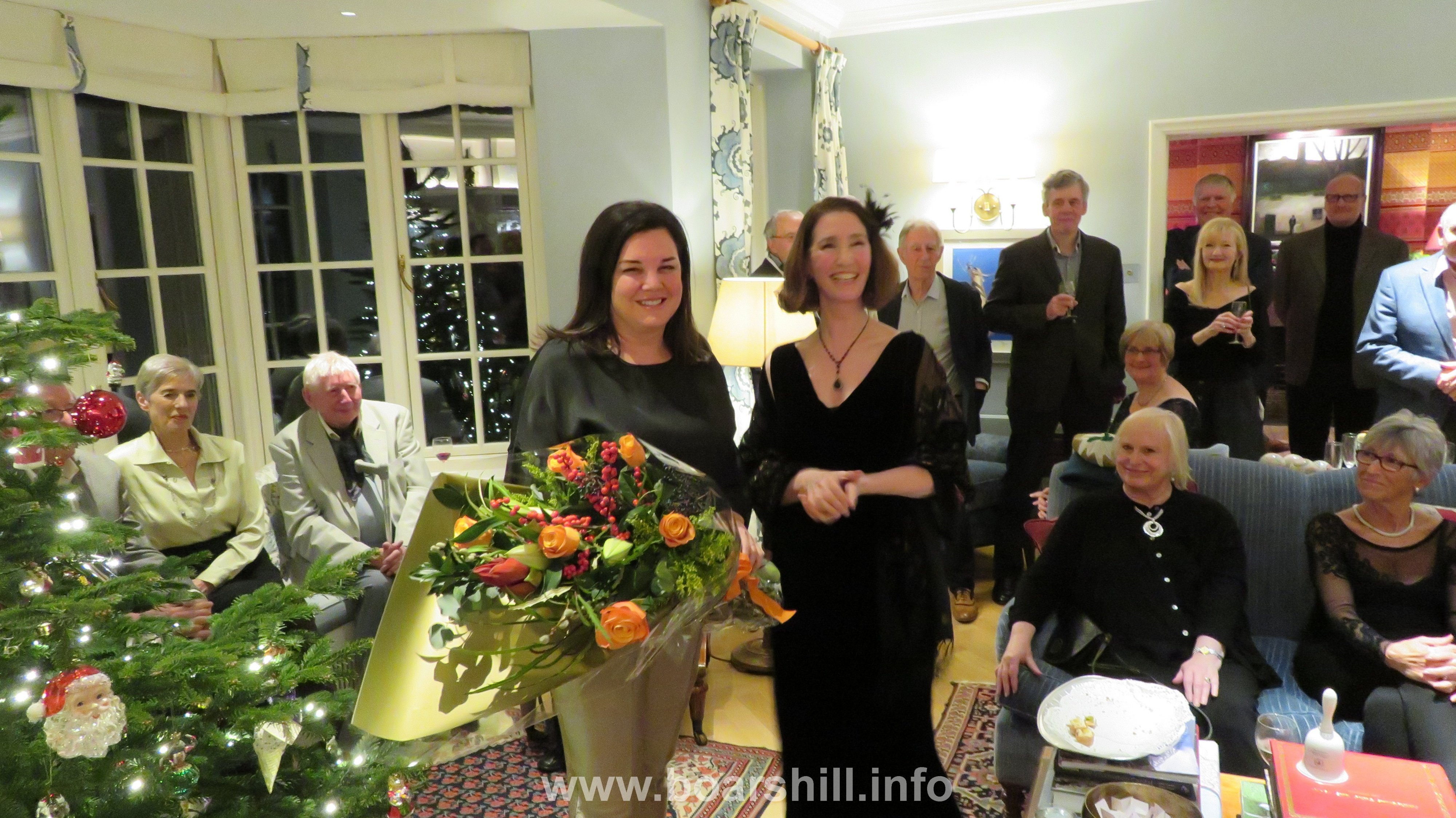 Hostess, Wendy Becker, receiving a thank you bouquet from BHA Chairman, Kate O'Donovan.